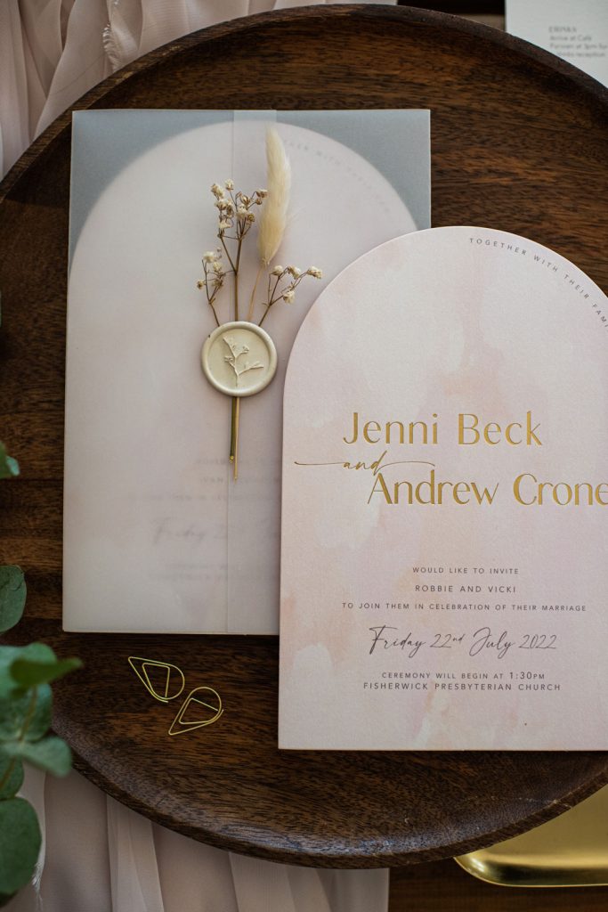 modern arched wedding invitation with gold hot foil and dried floral details