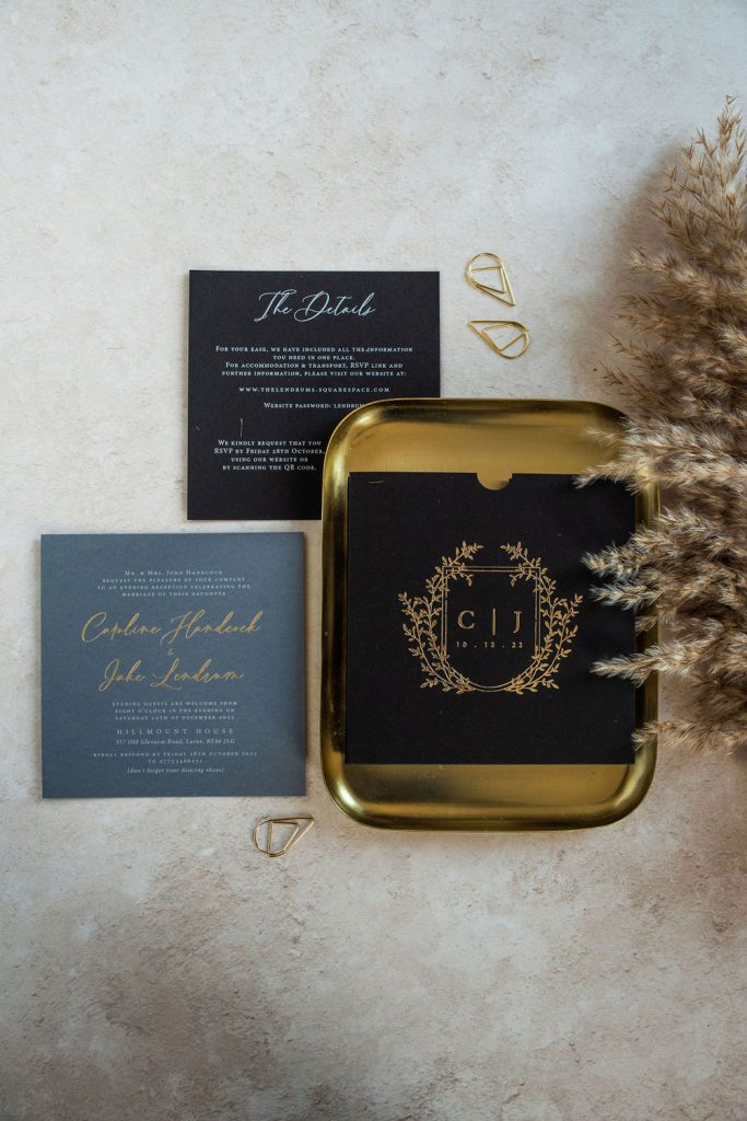 black and gold wedding invitation with hot foil printing