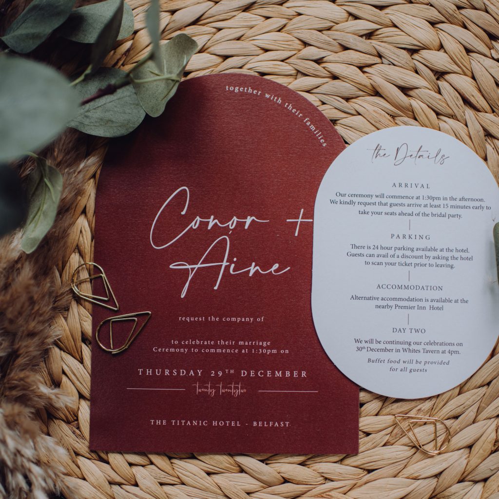 Rust coloured Arch invite and double arch information card in white. Bespoke wedding stationery design