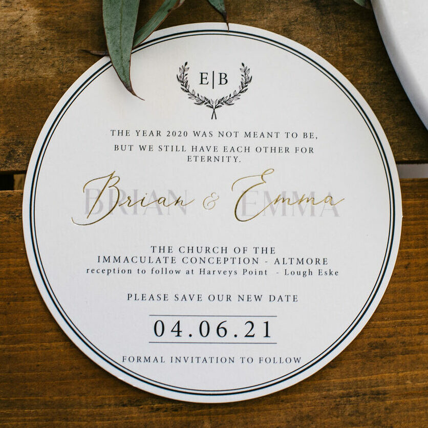 round save the date card with hot foil printing in gold